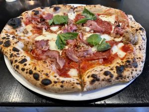 Quattro Carni Wood-Fired Pizza.